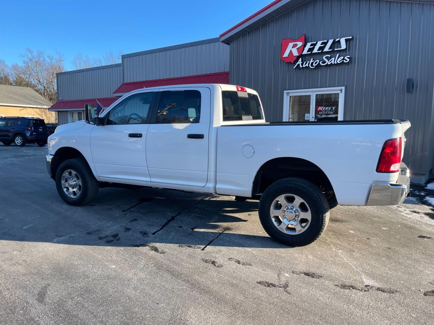 2016 White /Black RAM 2500 Outdoorsman Crew Cab SWB 4WD (3C6UR5DL4GG) with an 6.7L I6 OHV 24V TURBO DIESEL engine, 6A transmission, located at 11115 Chardon Rd. , Chardon, OH, 44024, (440) 214-9705, 41.580246, -81.241943 - Photo#13